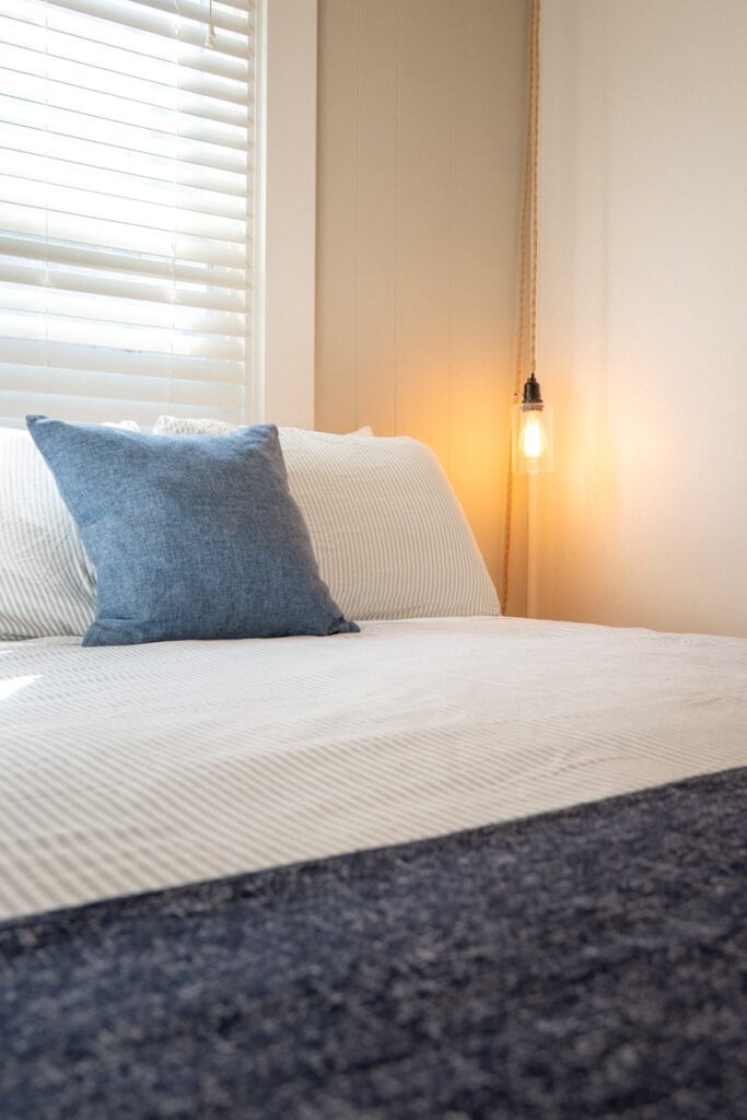 bed-inside-of-boardwalk-cottages