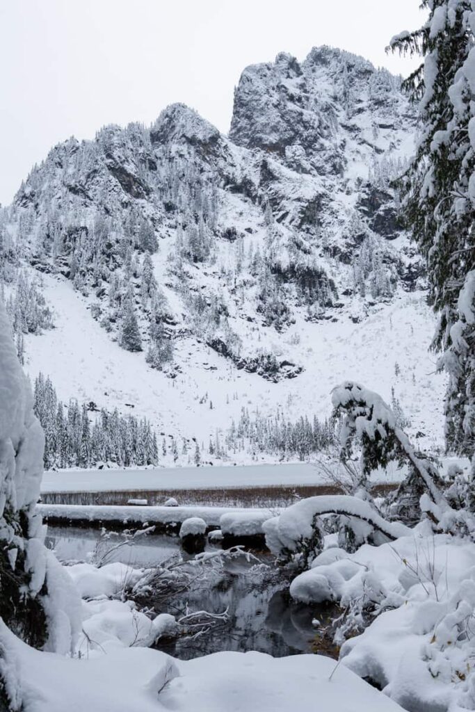 heather lake perched below towering cliffs of mt pilchuck